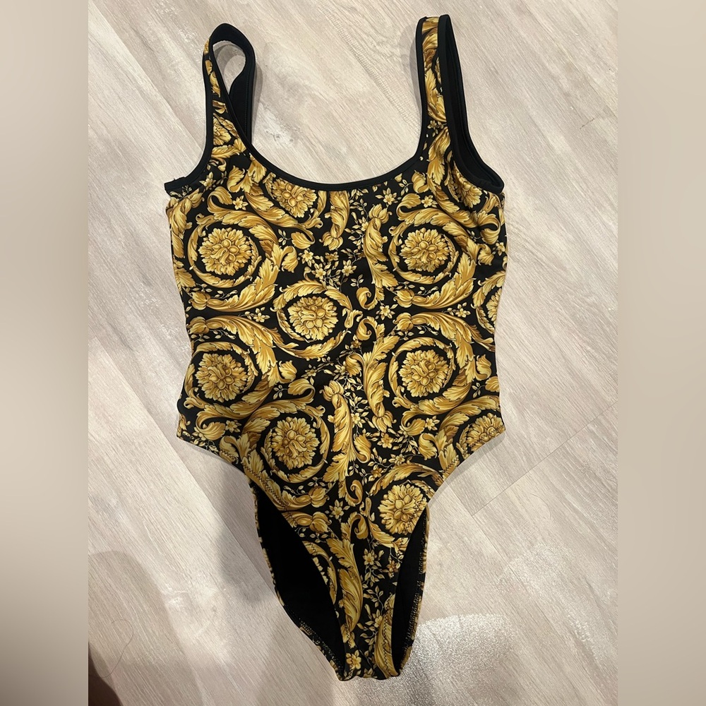 Versace one piece swimsuit , never worn without tags , size small (1)